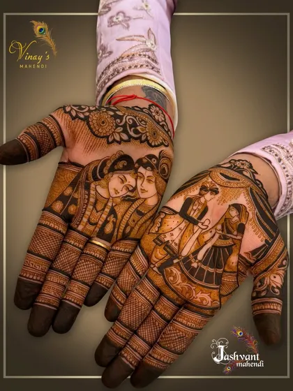 An angled shot providing a clear view of the intricate details in the groom's varmala and Radha-Krishna henna.