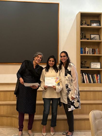 An educator receives her certificate upon completing our leadership program. We are proud to invest in our team, creating meaningful pathways for them to grow as leaders and mentors.