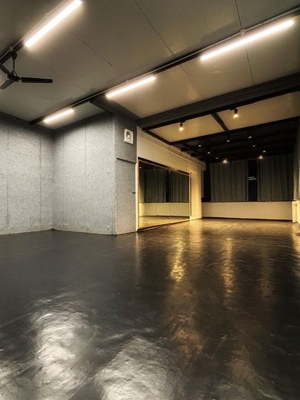 Another angle of the studio, highlighting the acoustic wall panels. These are important for ensuring great sound quality during our classes, whether we're using Bollywood beats or calming yoga music.