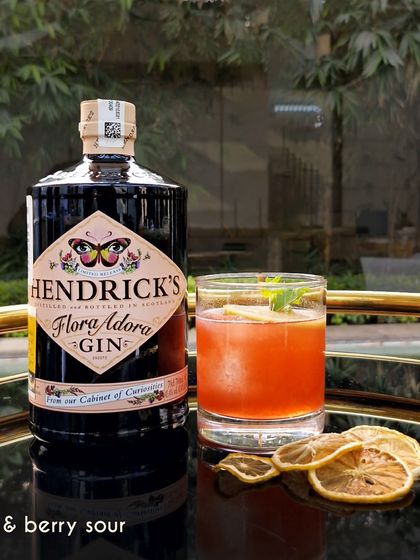 In collaboration with Hendrick's Flora Adora Gin, we created the Mint & Berry Sour. This vibrant cocktail balances the gin's floral notes with the freshness of mint and the tartness of berries, infused with hibiscus for a deep, ruby color.