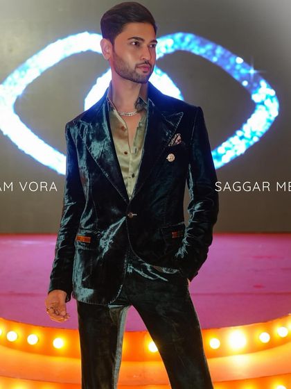 Jainam Vora acing the look in our deep green velvet tuxedo. This ensemble is a statement of impeccable taste and timeless allure.