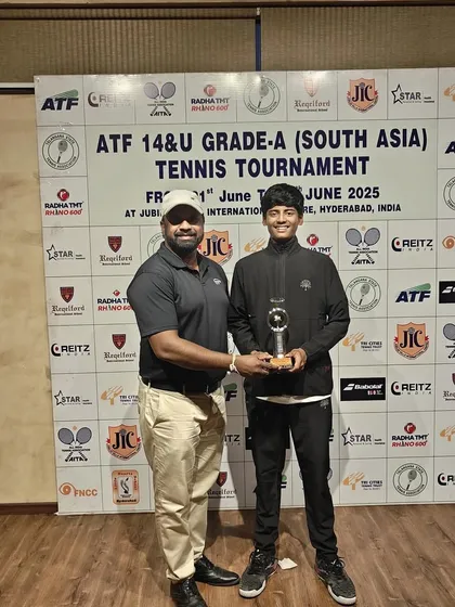 A coach's pride is in his player's success. Presenting the trophy to Rishikesh Mane for his podium finish at the ATF 14&U Grade A tournament in Hyderabad. His dedication is an inspiration.