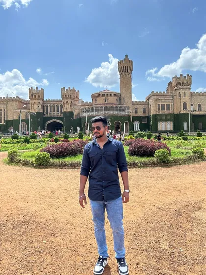 The magnificent facade of Bangalore Palace on a clear day. It's a must-visit for history and architecture enthusiasts.
