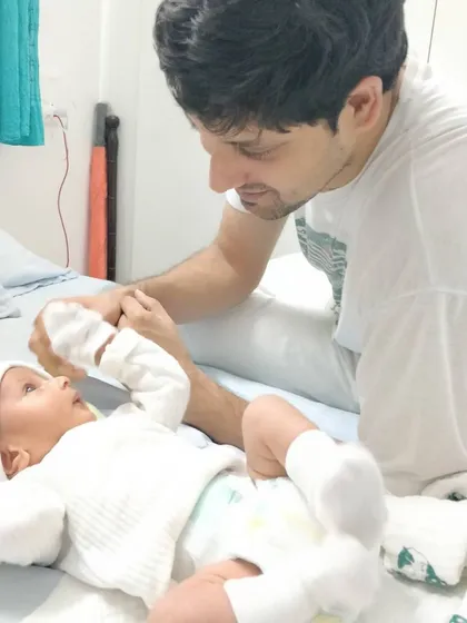 Another precious moment with my husband and our newborn. These moments remind me of the importance of family and the journey we are all on.