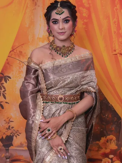 The model's pose highlights the intricate details of the waist belt and the choker.