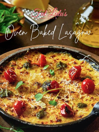 Our Oven Baked Lasagna is pure comfort in a dish. Layers of pasta, rich meat sauce, and creamy béchamel are baked with cheese until bubbly and golden.