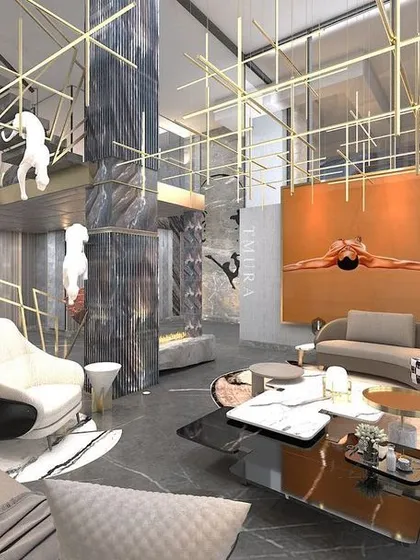 We believe in making bold statements. This multi-level living area showcases our ability to work with grand volumes, using dramatic marble, sculptural art installations, and custom grid lighting to create a space that is both monumental and inviting.