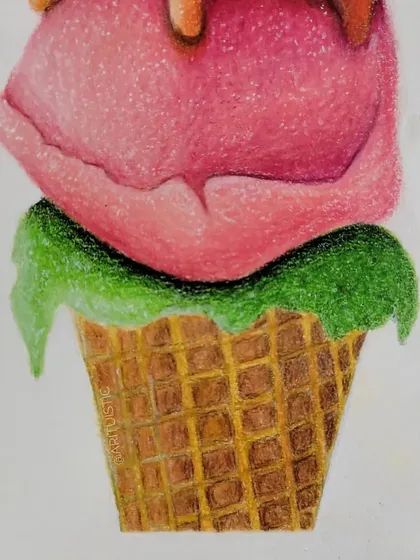 A close-up of the bottom two scoops and the cone, showing the waffle texture.