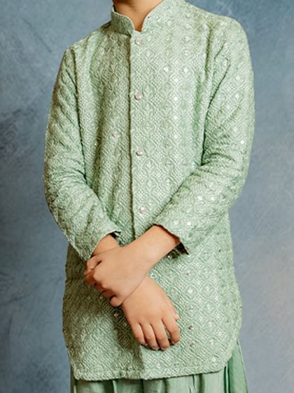 Another close-up of the mint green Patiala kurta, emphasizing the quality of the fabric and the fine stitching.