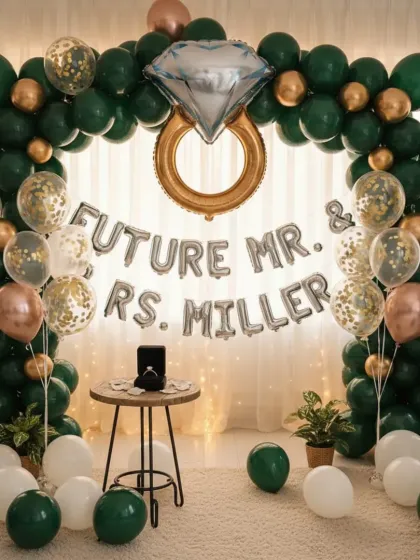 This is a complete engagement party setup I designed, featuring a lush balloon arch in an elegant green and gold theme. I included custom foil balloons for the couple's name and a large diamond ring balloon to create a perfect photo backdrop for their special announcement.