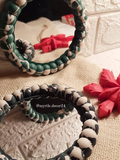 Another view of our aesthetic Bubble Mirrors, reflecting a hint of Christmas decor. They are a playful yet stylish addition to a gallery wall or entryway.