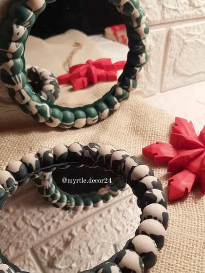 Another view of our aesthetic Bubble Mirrors, reflecting a hint of Christmas decor. They are a playful yet stylish addition to a gallery wall or entryway.