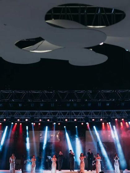 A wide shot of the Shillong Chamber Choir on stage, showing their synced presentation and the grand scale of the production.