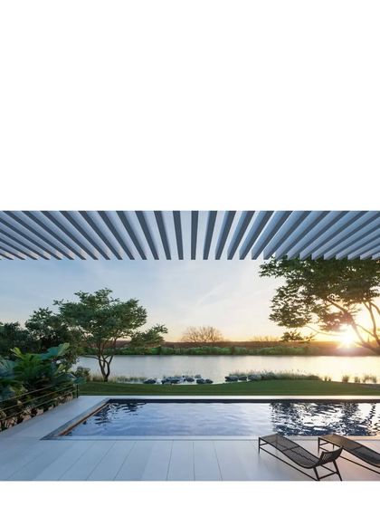 A rendering of the 'Koba House' pool, overlooking the Sabarmati river. The design frames the sunset, making the changing light a central feature of the home.