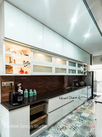 Another view of the galley kitchen from image 79, highlighting the mix of textures and patterns.