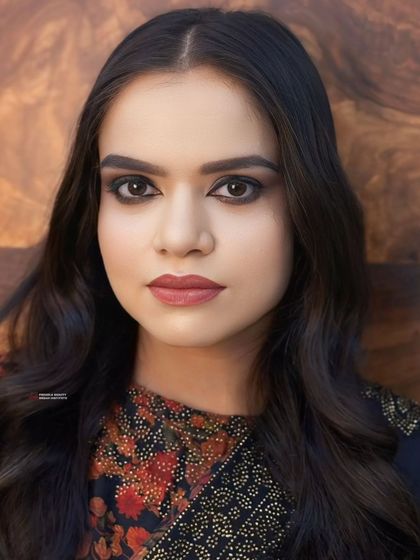 A touch of glam, a whole lot of fun. This close-up shows the power of a well-defined eye and a perfect lip to elevate your entire look.