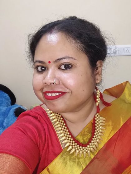 A selfie of me wearing my unique yellow spike choker. It's a bold and modern design that can also be worn as a necklace.