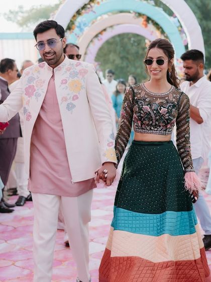 The couple's happy walk down the aisle at their carnival.