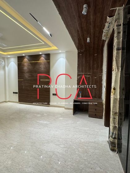 A duplicate of image 164, showcasing the rich, dark wood paneling that defines this space in the Vasant Kunj home.