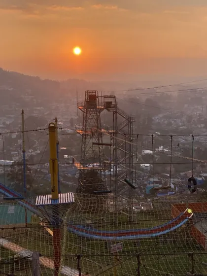 An adventure park in Ooty at sunset. Our itineraries often include a mix of nature, culture, and fun activities.
