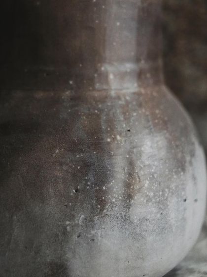 A close-up of the 'Stardust' effect. The tiny white specks against the smoky, matte surface are just so delicate and lovely.