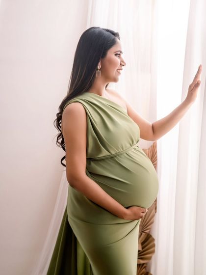 Looking towards the future. I love using natural window light to create soft, contemplative portraits that capture the anticipation of motherhood.