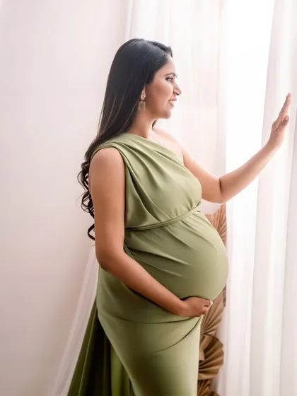 Looking towards the future. I love using natural window light to create soft, contemplative portraits that capture the anticipation of motherhood.