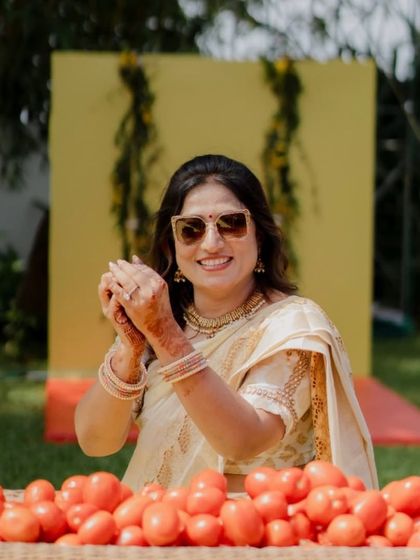 A guest ready for the tomato festivities to begin. We handle all the logistics, from sourcing the tomatoes to the cleanup, so you and your guests can simply enjoy the moment.