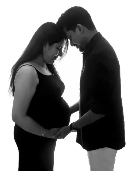 A beautiful and intimate silhouette. This black and white portrait, with your foreheads together, is a powerful and emotional image of your bond.