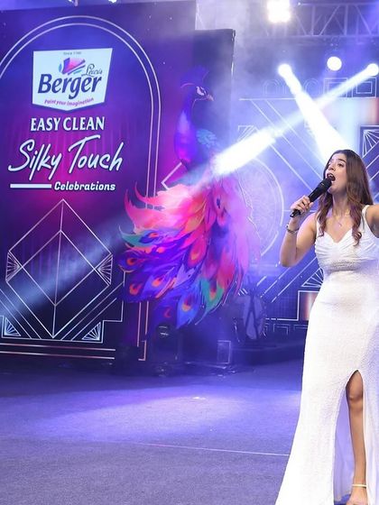 Commanding the stage at the Berger Paints 'Easy Clean Silky Touch' launch. The lighting and stage effects were fantastic.