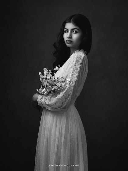 In shadows and light, the soul speaks louder. This black and white version of the woman in lace is ethereal and timeless.