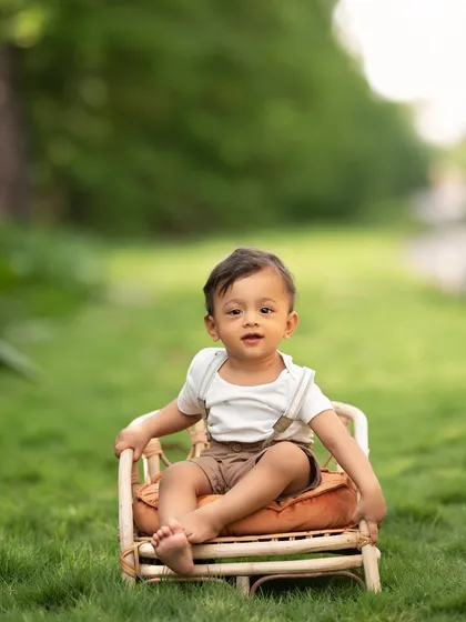 A sweet, relaxed portrait of a toddler enjoying the fresh air during an outdoor session.