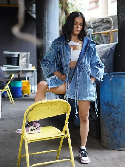 Srishti Shrivastava owning the street style look. The oversized denim jacket, shorts, and Nike sneakers create a perfect balance of fashion and comfort with a whole lot of attitude.