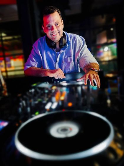 A dynamic shot from a Bollywood night at Boss Burger. I love playing high-energy desi sets that get everyone singing and dancing.