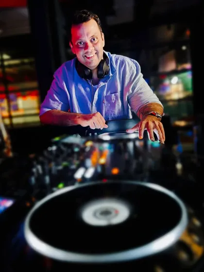 A dynamic shot from a Bollywood night at Boss Burger. I love playing high-energy desi sets that get everyone singing and dancing.