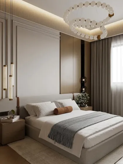 This bedroom uses a soothing neutral palette and elegant lighting. The design includes a comfortable bed, stylish pendant lights, and a large window for natural light.