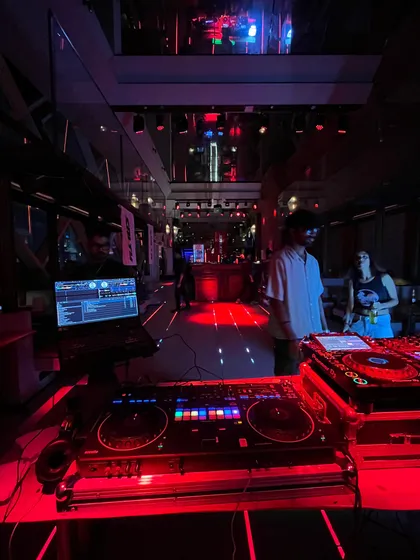 A shot of the setup at the Get Salty event in India. The red lighting and atmosphere were perfect for the kind of set I love to play.
