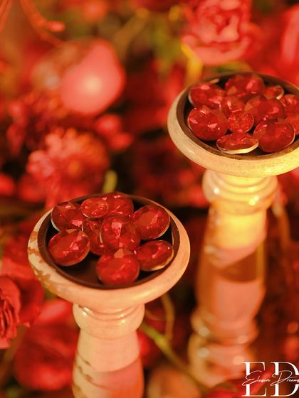 Another angle of the red gems, showing their faceted surfaces catching the light.