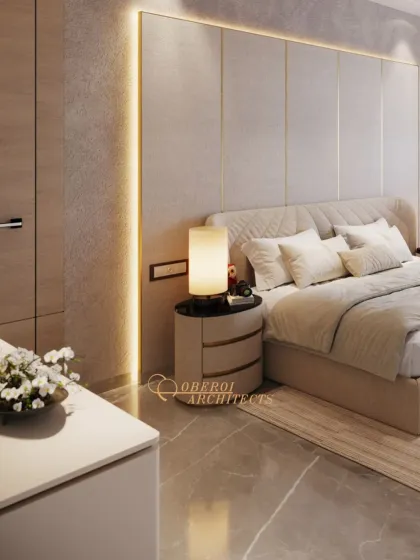 This angle highlights the elegant bedside tables and the soft glow of the integrated LED lighting along the headboard wall, adding to the room's sophisticated ambiance.