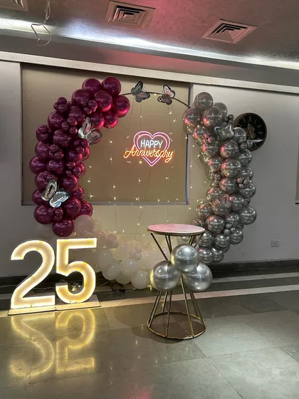 A full view of the 25th-anniversary setup, including the large light-up marquee numbers.