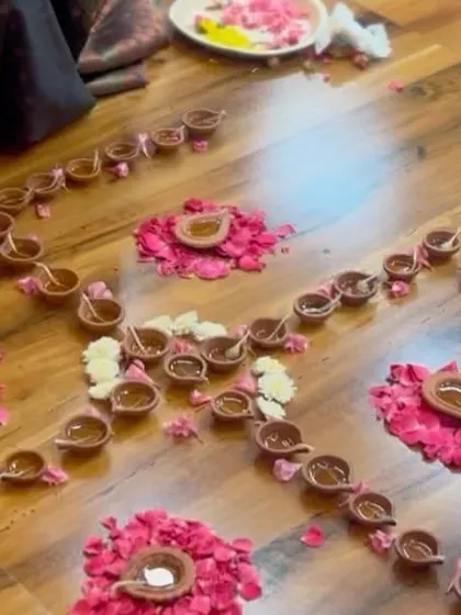 A beautiful rangoli made of diyas and flower petals, created by our students. These traditions are not just decorative; they are a form of meditation and an expression of devotion that strengthens our bond with our culture.