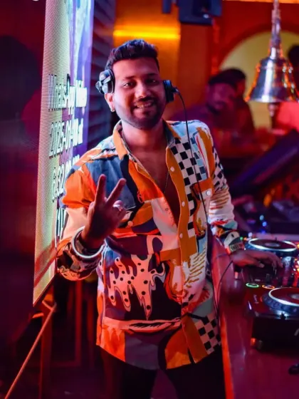 Rocking a colorful shirt and a peace sign. My style is as eclectic as my music.