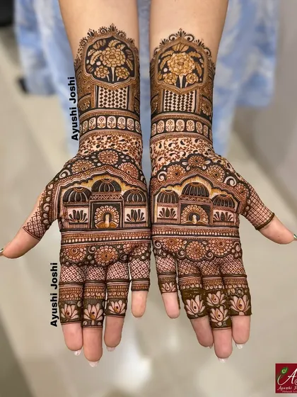A gorgeous Indian floral design. This style uses bold flower motifs combined with architectural elements like palace windows and fine latticework for a unique, figure-free look.