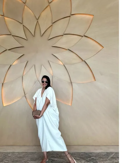 The beauty of a white kaftan is its simplicity and grace.