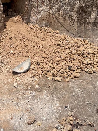 This is the result of the kiln's work: a pile of quicklime. This material will be carefully slaked with water to create lime putty, the base for the breathable, durable, and beautiful plasters that finish our walls.