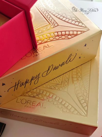 Adding a personal touch directly onto the gift boxes. A simple "Happy Diwali" in modern calligraphy makes the gift feel extra special.