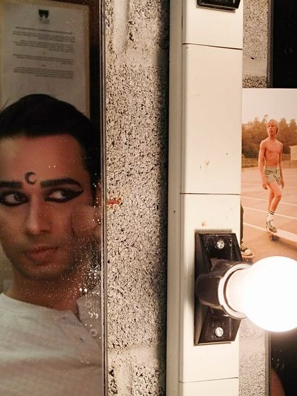 A throwback to a performance in New York. The green room mirror has seen many faces and characters over the years.