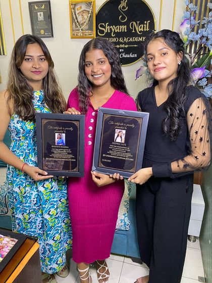 Two more graduates from our pro course, smiling with their certificates. Join our next batch to start your journey.