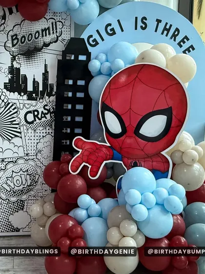 A close-up of the cute, cartoonish Spider-Man cutout and the detailed comic book art panel I designed for this third birthday party.