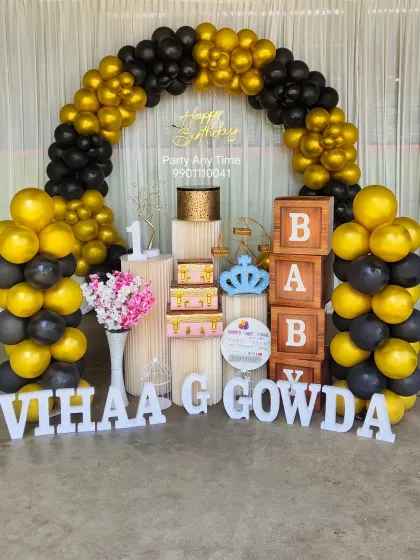 A classic black and gold theme for Vihaa's first birthday. This elegant combination is perfect for a sophisticated celebration.